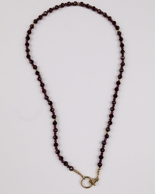 COURAGEOUS GARNET OVAL CLASP NECKLACE