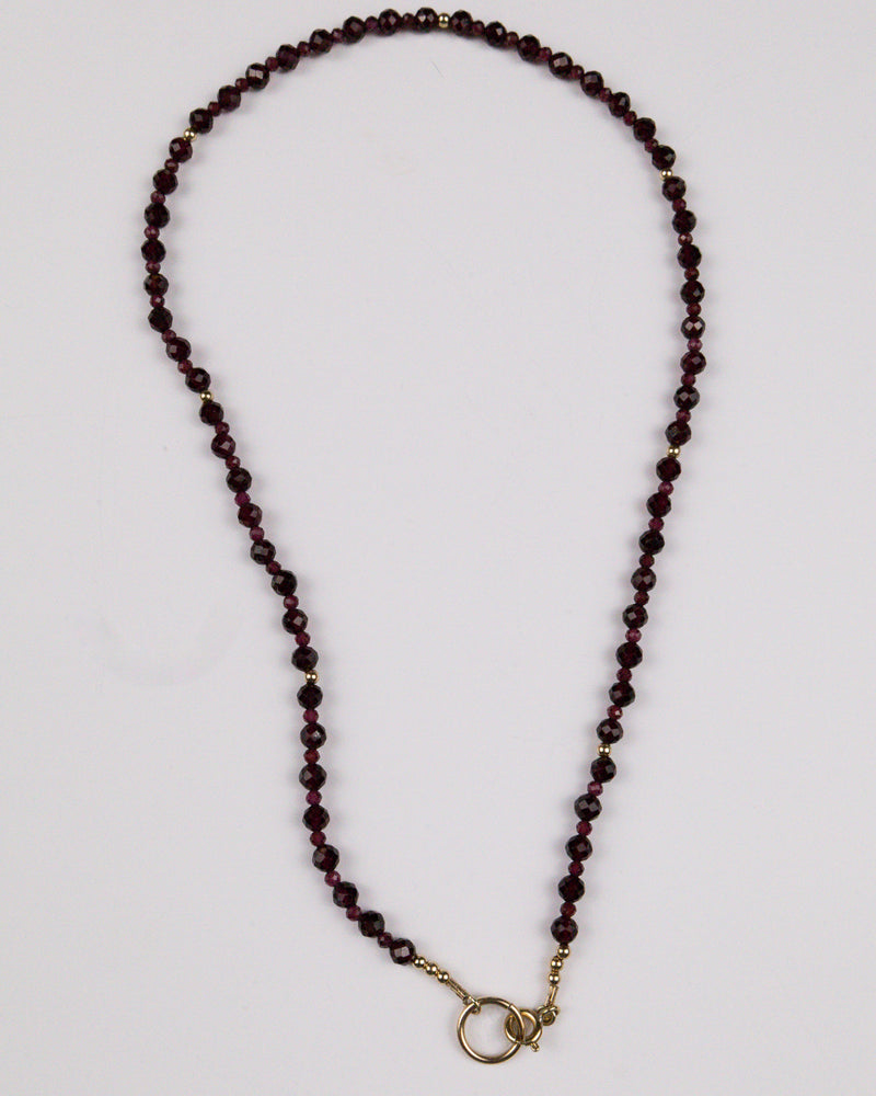 COURAGEOUS GARNET OVAL CLASP NECKLACE