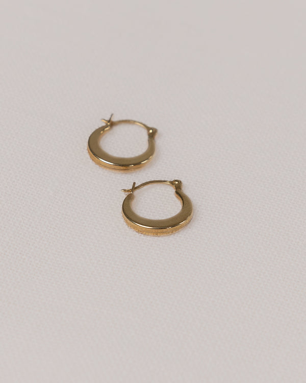 14K yellow gold huggie hoops