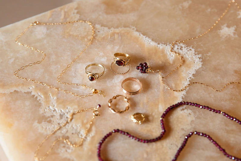 14K yellow gold round garnet ring