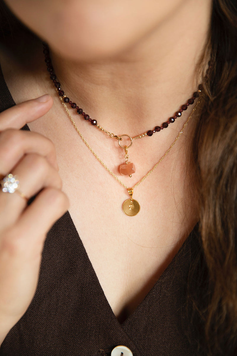 COURAGEOUS GARNET OVAL CLASP NECKLACE